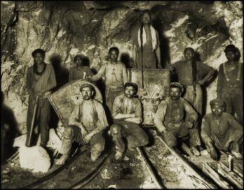 Black, Chinese & White Laborers in S. African Gold Mine [c1890-1923] Frank & Frances Carpenter. Credit: ralphrepo/CCA 2.0 generic license